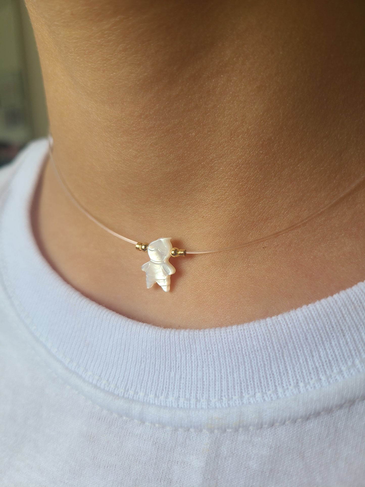 1 niño de nacar (Lee la descripción)