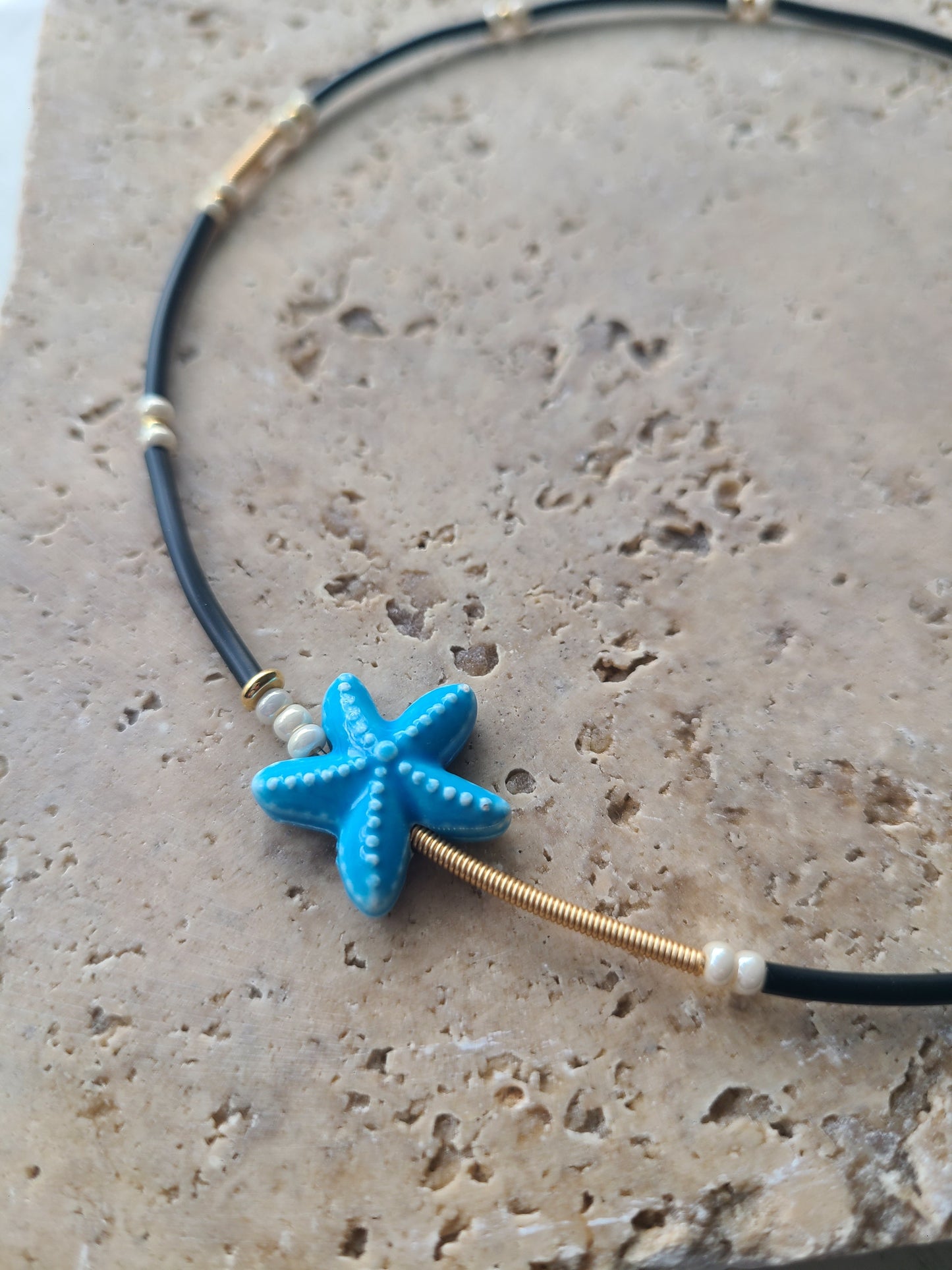 Gargantilla con estrella de mar.