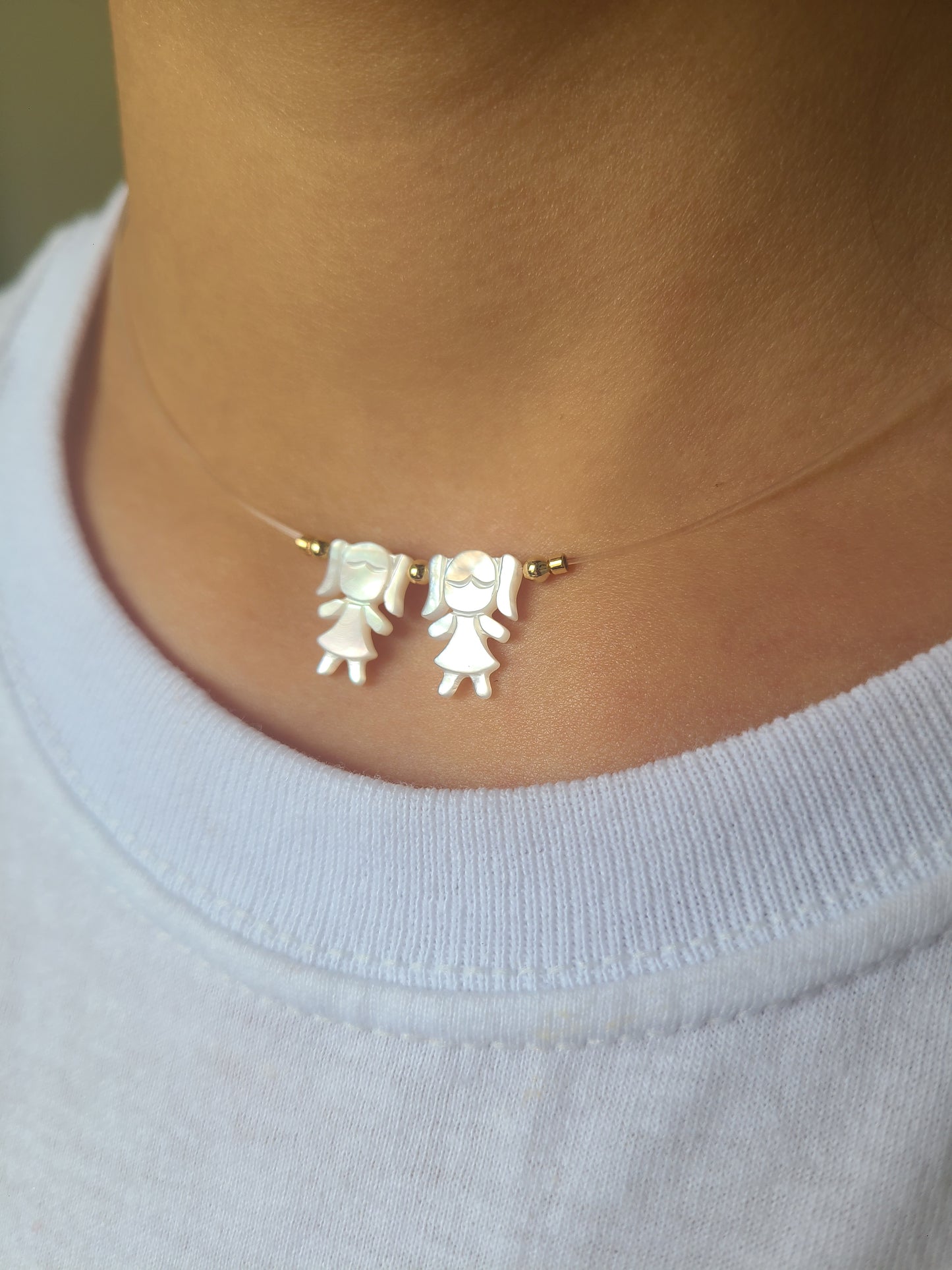 2 niñas de nacar(Lee la descripción)