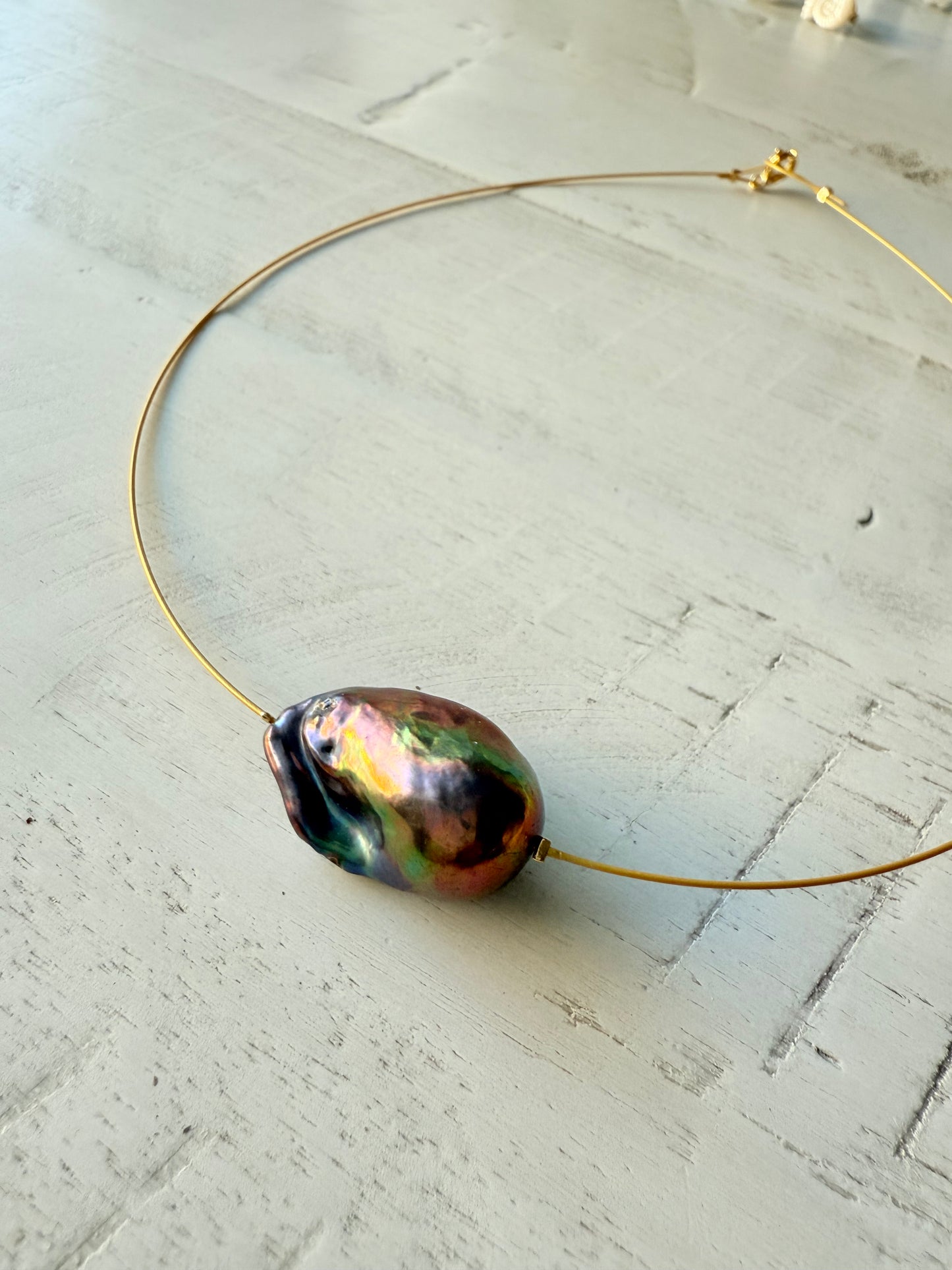 Wow! Perla negra tornasol…