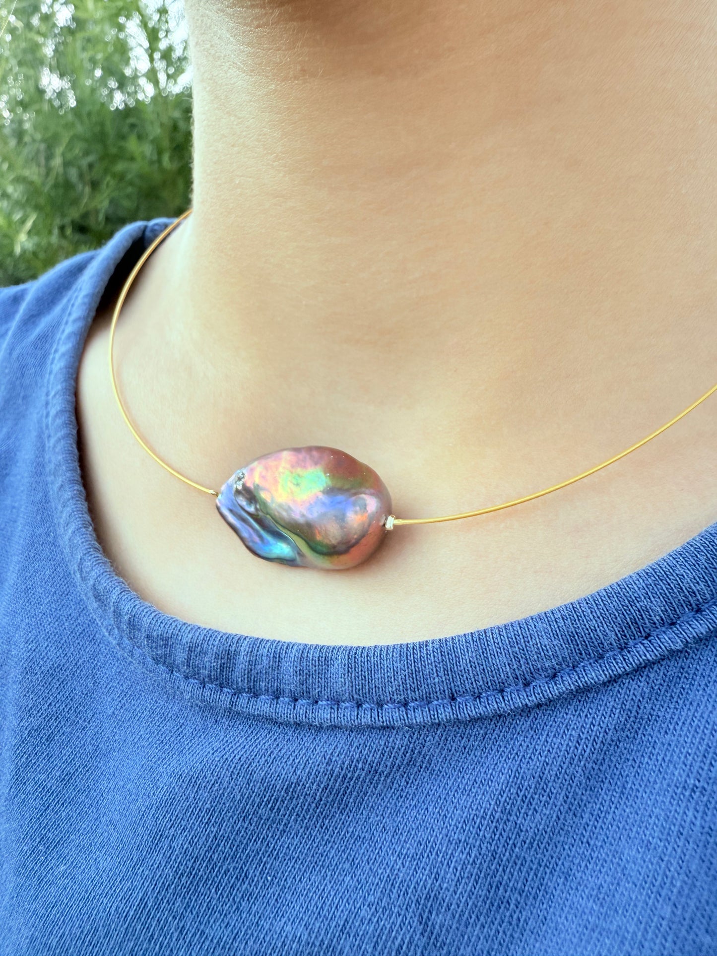 Wow! Perla negra tornasol…